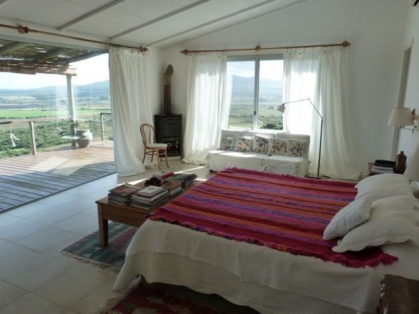 Espectacular casa sobre la ladera del Cerro Pan de Azúcar, con vistas al Mar y a las Sierras.