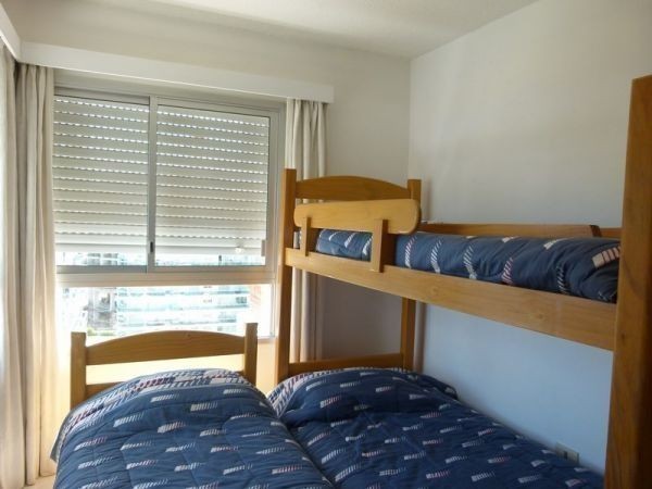 Torre con el sello de Arq. Pintos Risso en zona de Aidy Grill.