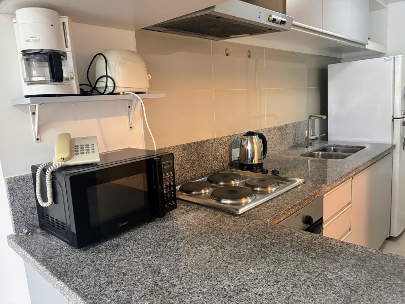 Departamento en Edificio con servcios sobre Av. Roosevelt.