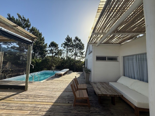 Casa de playa en una planta en Club de Mar