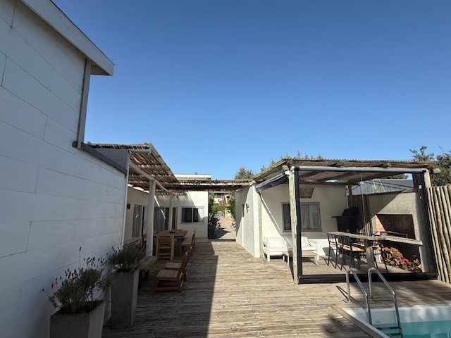 Casa de playa en una planta en Club de Mar