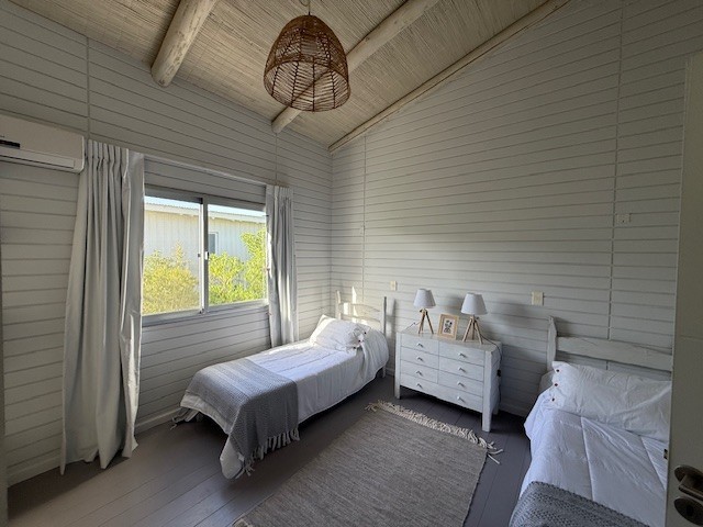 Casa de playa en una planta en Club de Mar