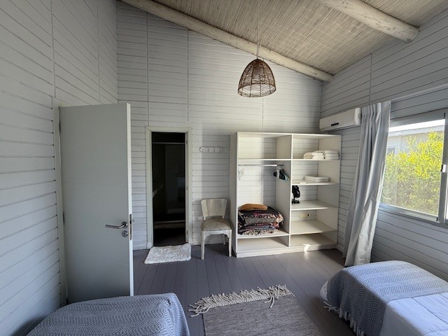 Casa de playa en una planta en Club de Mar