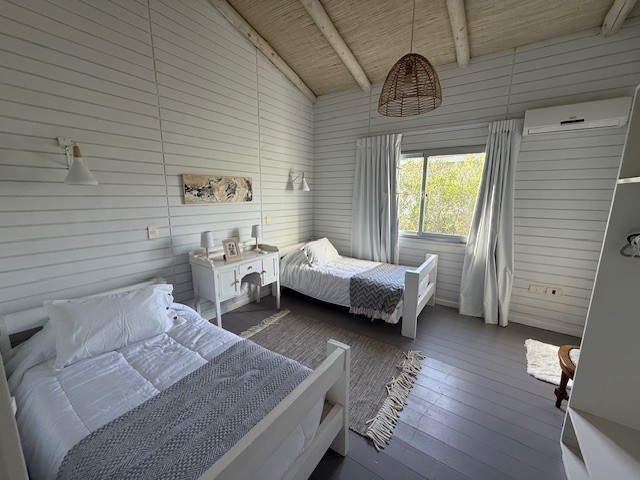 Casa de playa en una planta en Club de Mar