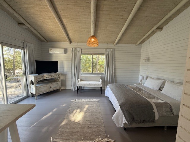 Casa de playa en una planta en Club de Mar