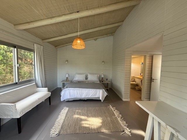 Casa de playa en una planta en Club de Mar