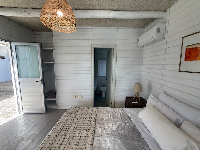 Casa de playa en una planta en Club de Mar