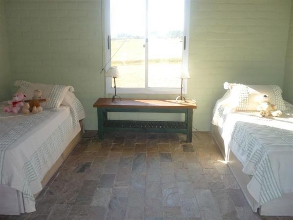 En alquiler y venta amplia y luminosa chacra en El Quijote.