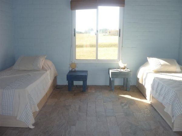 En alquiler y venta amplia y luminosa chacra en El Quijote.