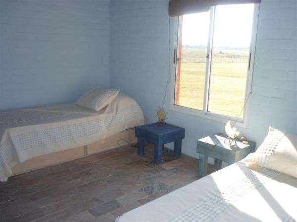 En alquiler y venta amplia y luminosa chacra en El Quijote.